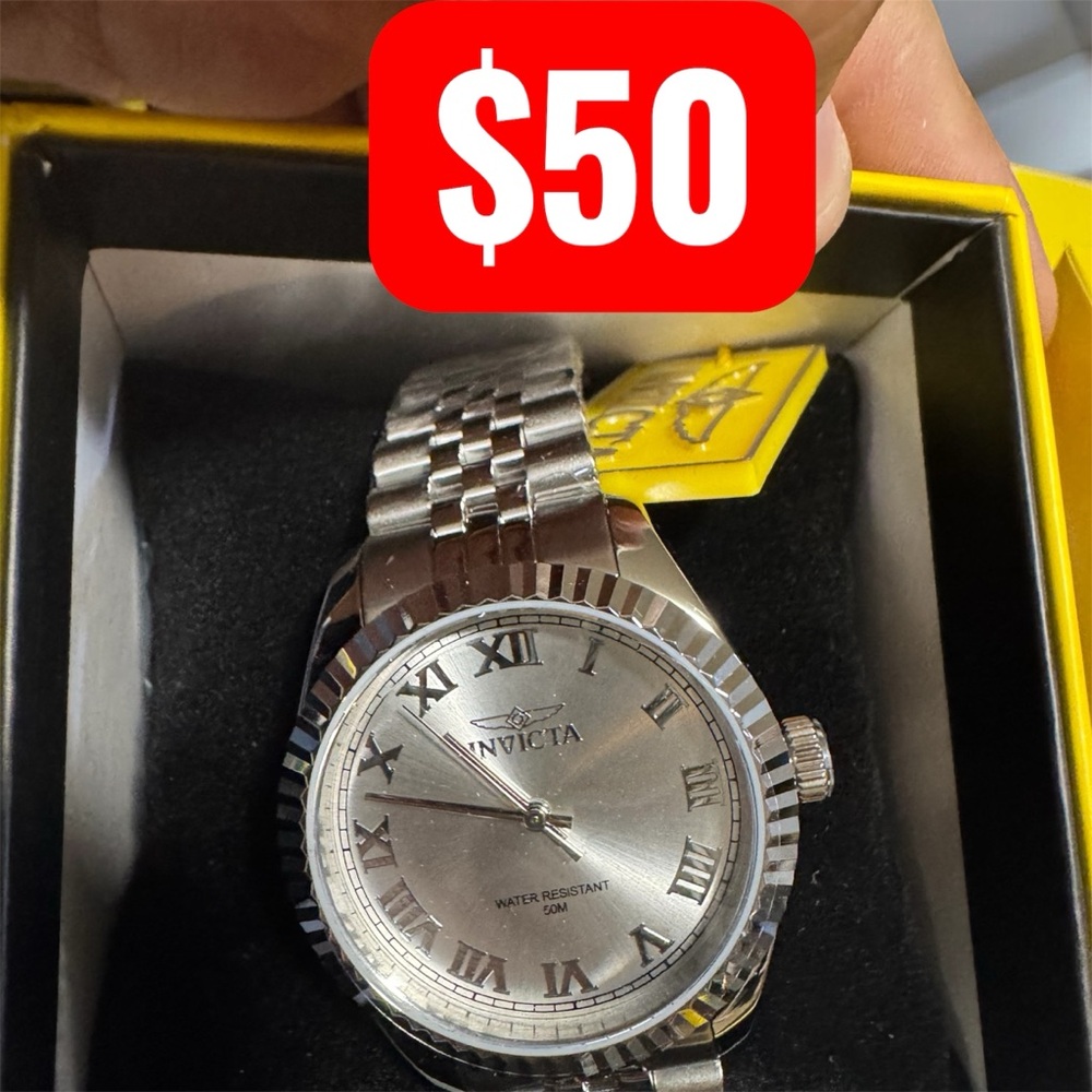 Invicta Specialty model 47409 Silver Watch with Black Roman Numerals